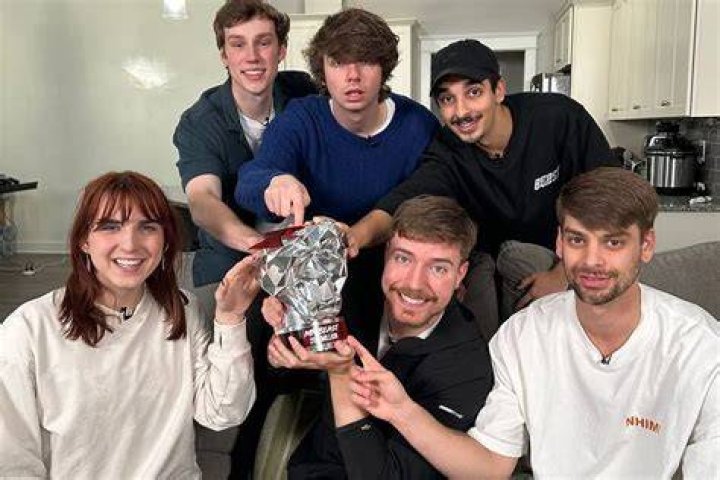 MrBeast receiving an award MrBeast receiving an award